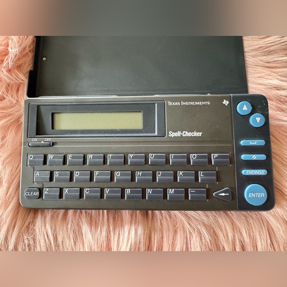 Texas Instruments Black and Blue Spell-Checker